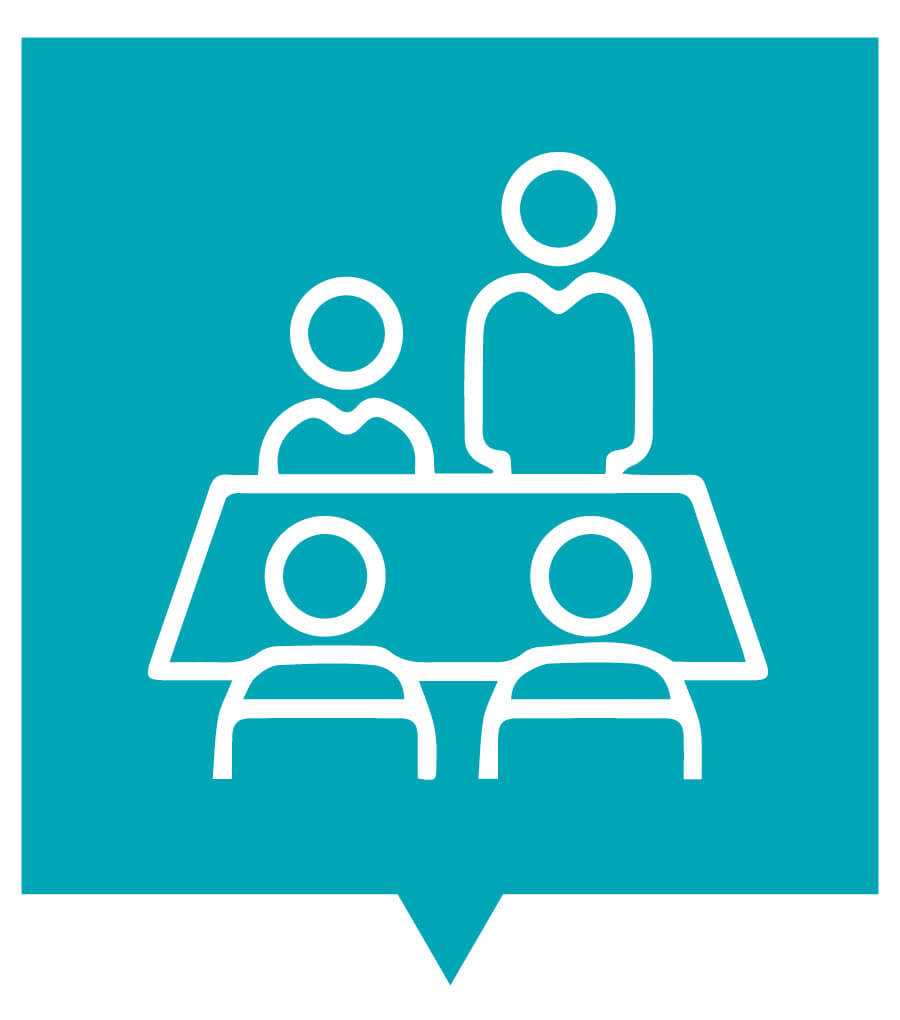 Computer-illustrated graphic. The background is turquoise. The graphic is a white outline of four people sitting at a table, and one person is standing up.